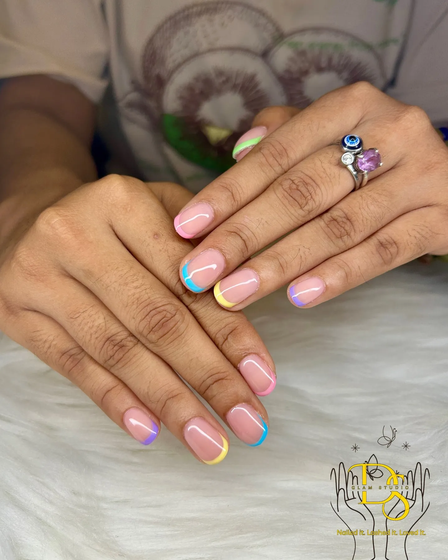 Nude pink nails with a pastel accent