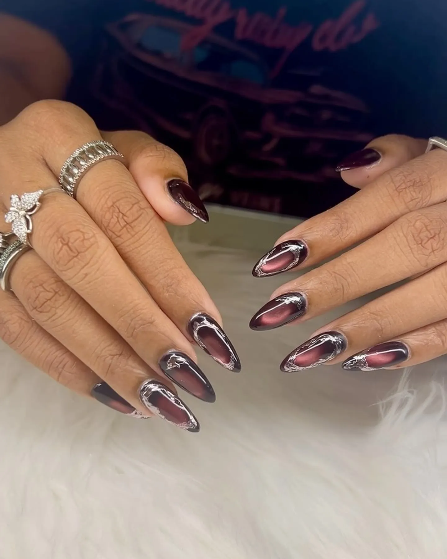 Smoky chrome almond nails