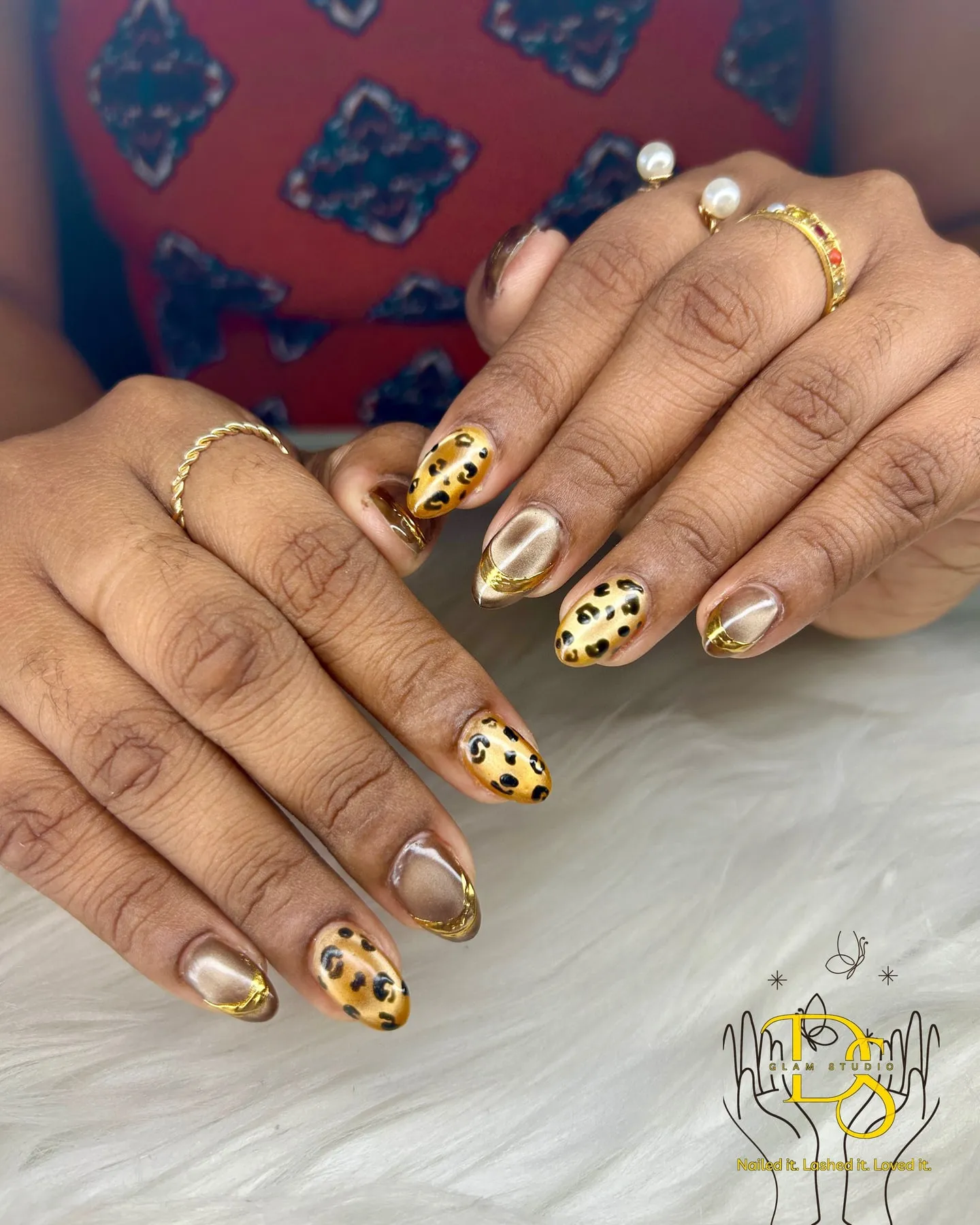 Leopard print accents on nude nails