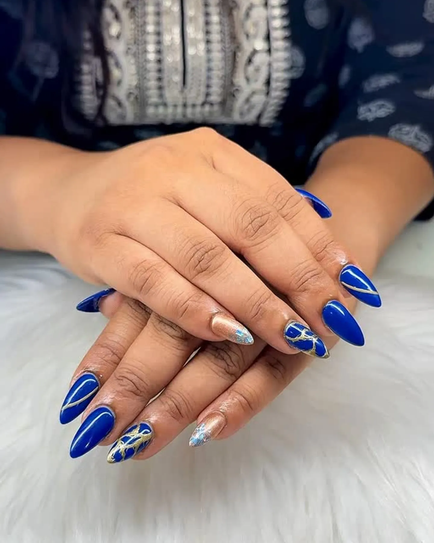 Royal blue nails with art accents