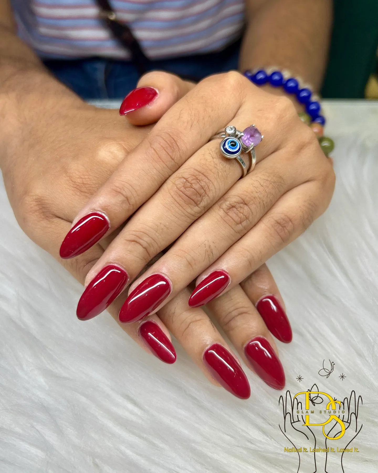 Long glossy red almond nails